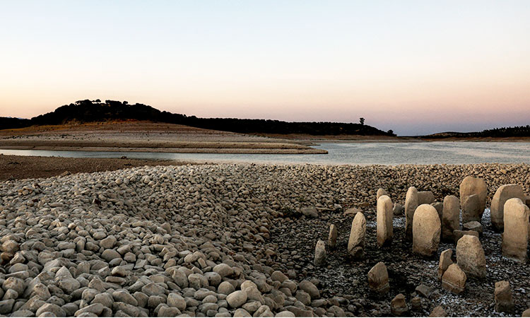 Europe's drought exposes ancient stones and World War Two ships as waters fall