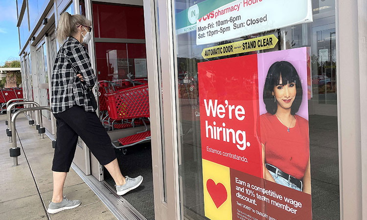 Surprise US job surge lifts employment back to pre-COVID levels