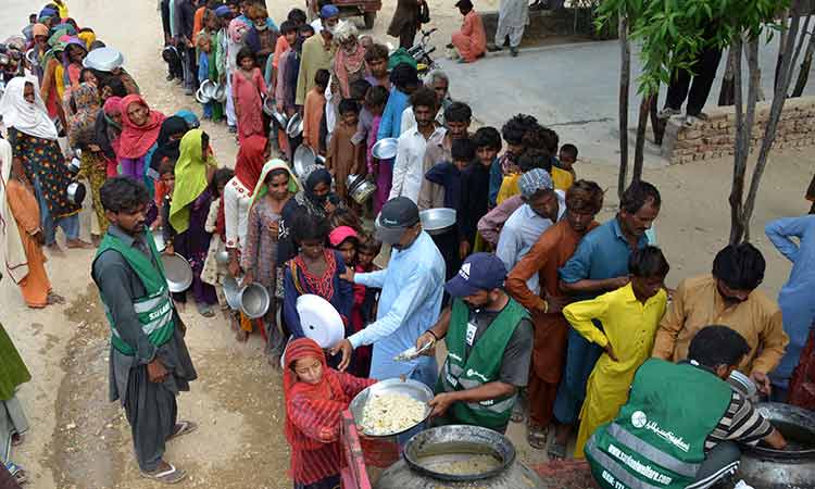 Pakistan scrambles to deliver aid as flood death toll rises