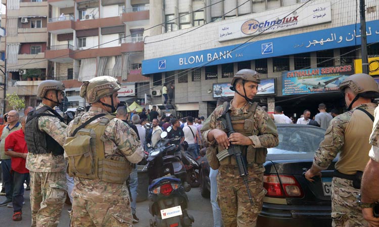 VIDEO: Frustrated Lebanese take up bank 'heists’ to free their frozen savings as cash crisis worsens