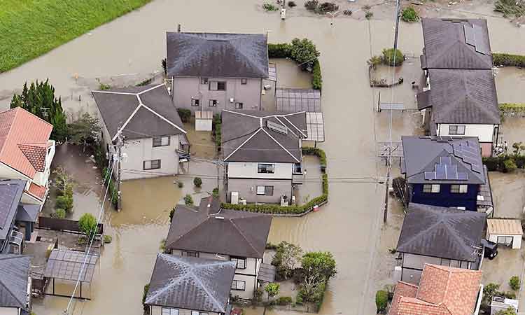 Storm damages space center in Japan, 130,000 still lack electricity