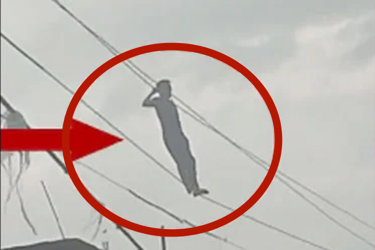 VIDEO: Youth performs stunt on 11 kV high-tension power lines in India