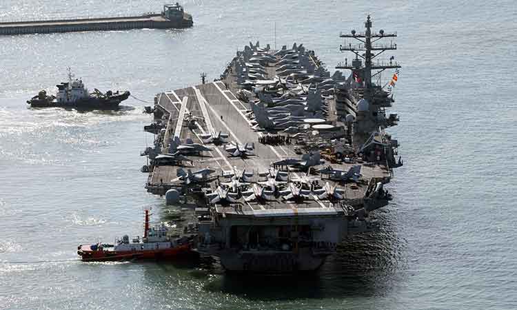 US aircraft carrier arrives in South Korea as North's leader Kim exchanges messages with Putin