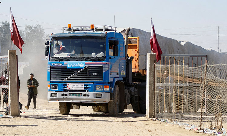 Aid trucks enter Gaza from Egypt after ceasefire begins