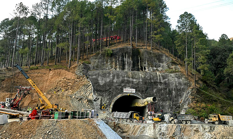 Indian rescuers, two weeks after tunnel collapse, try new tack to reach 41 workers