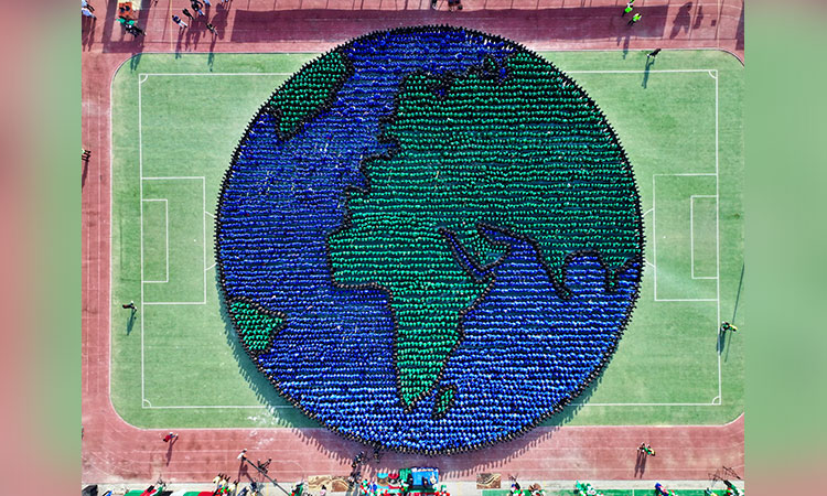 Sharjah's school crafts largest human image of Earth, enters Guinness