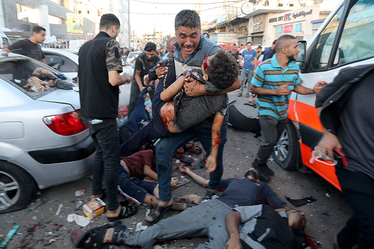 VIDEO: Israeli airstrikes hit a convoy of ambulances near Al-Shifa Hospital in Gaza, scores dead 