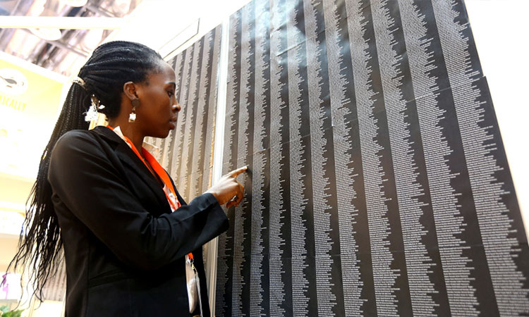 ‘Unfinished Stories,’ a wall with nearly 7,000 names of Gaza victims at SIBF