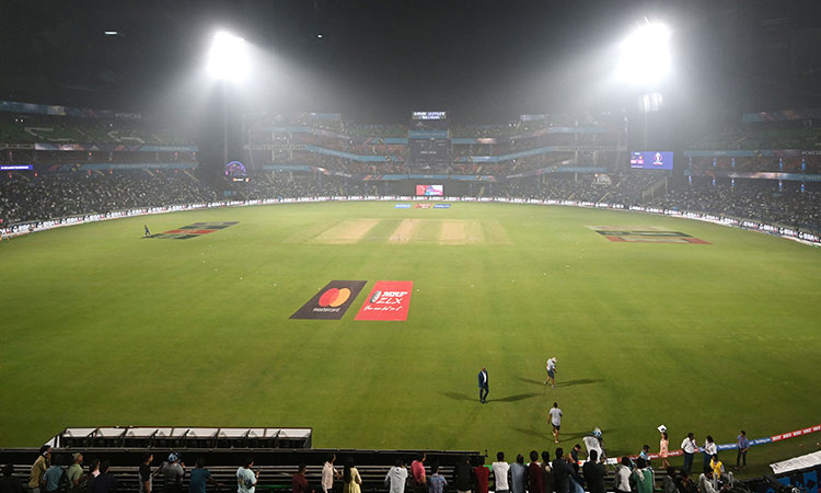 Cricket fans forgo facemasks as India's toxic smog clouds World Cup