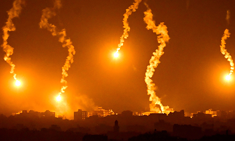 Israel begins new year under rocket barrage as army pounds Gaza