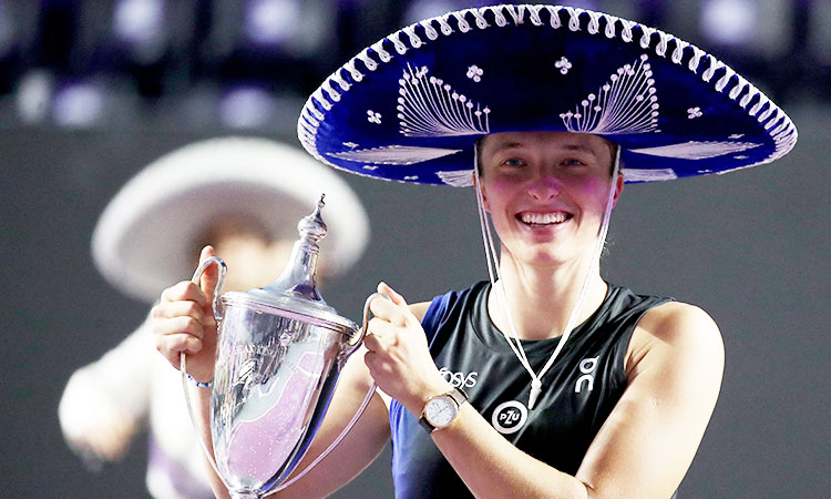 Swiatek routs Pegula to win WTA Finals, regains world number one ranking