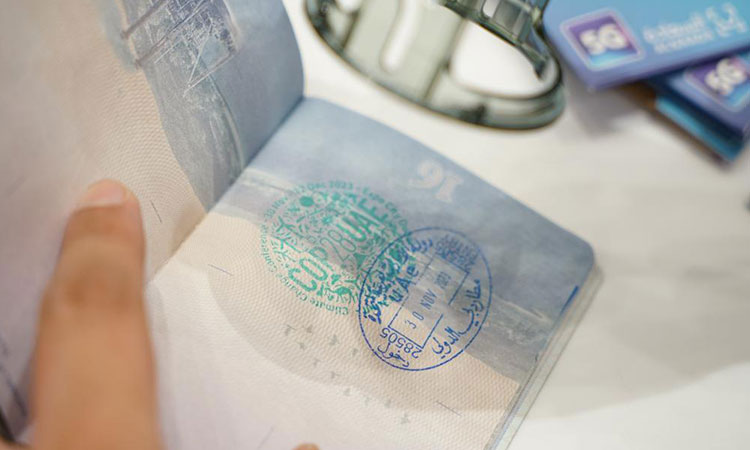 Dubai Airport puts special COP28 stamps on passports of travellers