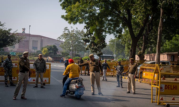 Man jumps into Indian Parliament, sets off smoke can in major security breach