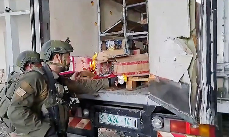 VIDEO: Israeli soldiers burn food and water supplies in Gaza’s Shujaiya area