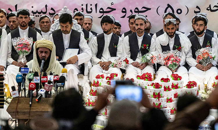 Afghans turn to mass weddings in bid to cut costs