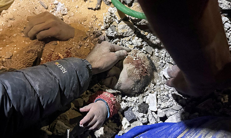 Baby saved from Gaza rubble after mother killed in Israeli strike