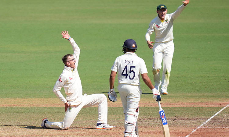 Murphy shines on debut, but Rohit's ton puts India on top against Australia in first Test