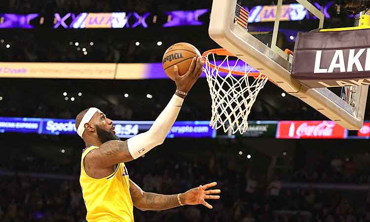 LeBron James chases NBA history on a star-filled night in Los Angeles