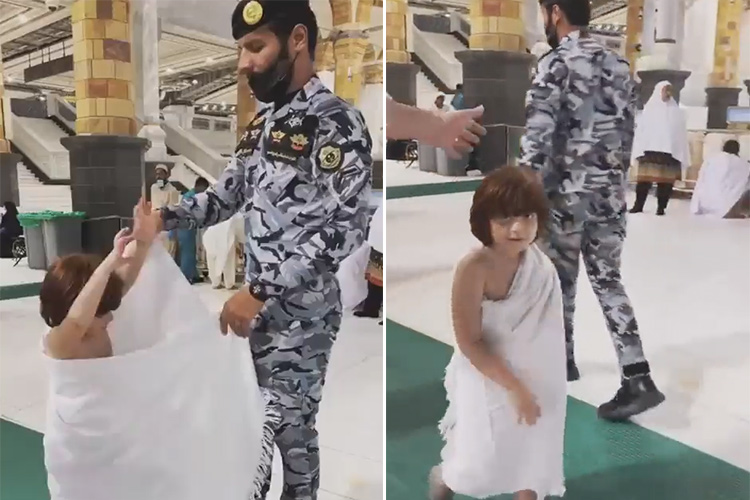 VIDEO: Saudi soldier helps a child wear the Ihram in the Grand Mosque of Makkah