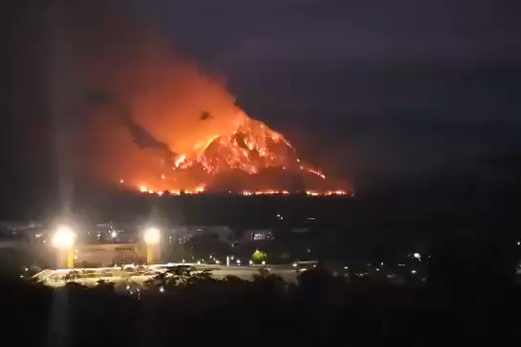 Thai authorities battle massive wildfires at two mountains