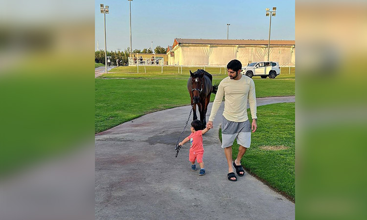 Sheikh Hamdan shares adorable picture of his son Rashid walking a horse