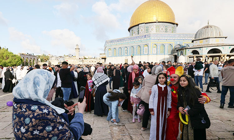 Muslims in Middle East, Europe and US celebrate Eid Al Fitr with feasts and prayers 