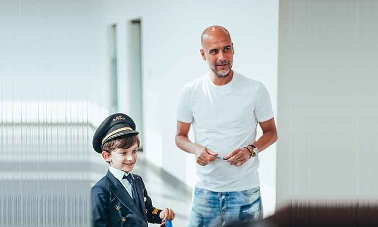 8-year-old boy teaches flying lessons to Manchester City's Pep Guardiola at Etihad