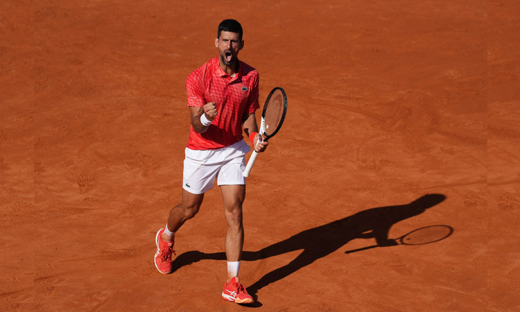 Djokovic battles past Dimitrov, Swiatek sweeps aside Tsurenko at Italian Open