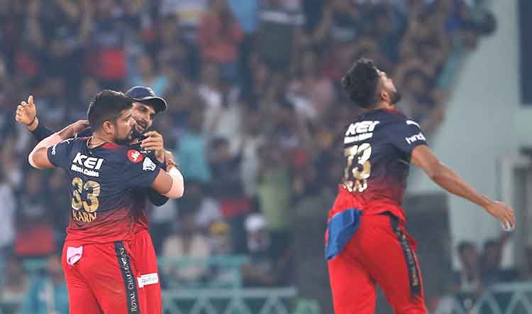 Hazlewood and Karn help RCB defend 126 against LSG