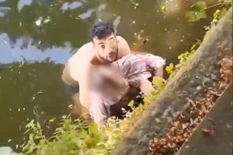 VIDEO: Homeless Algerian man saves a woman from drowning in Belgium 