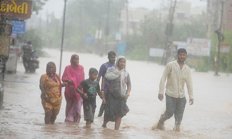 India struggling with floods after heatwave