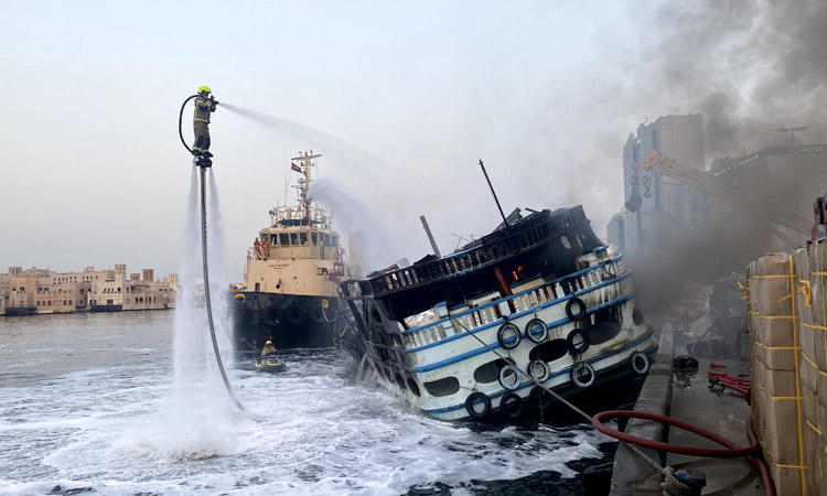 Dubai civil defence douses fire in a wooden boat in record time