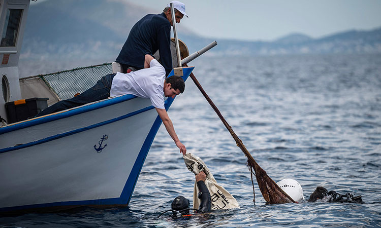 'Swimming in plastic:' By 2050 there will be more plastic than fish in the sea, says Greek fisherman