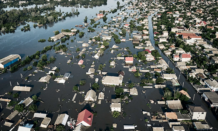 'You can't even see the roof:' Ukrainians flee dam flood