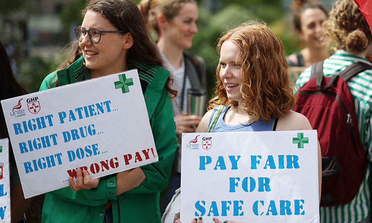 UK government offers millions of public sector workers pay hikes to end strikes