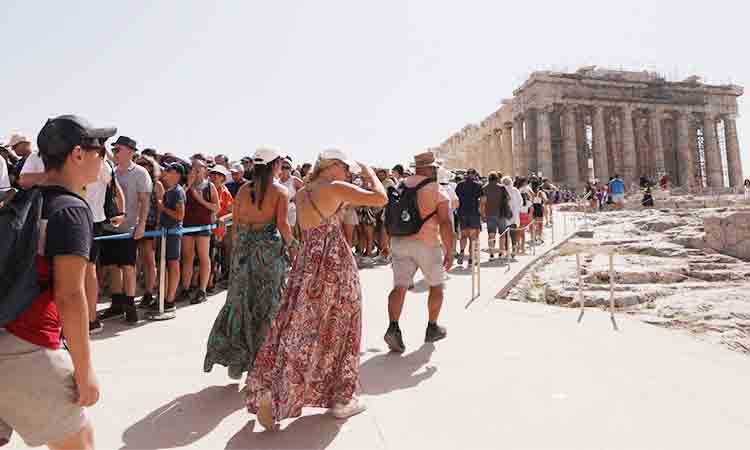 Greece shuts Acropolis site to protect tourists from heatwave; wildfires hit Croatia