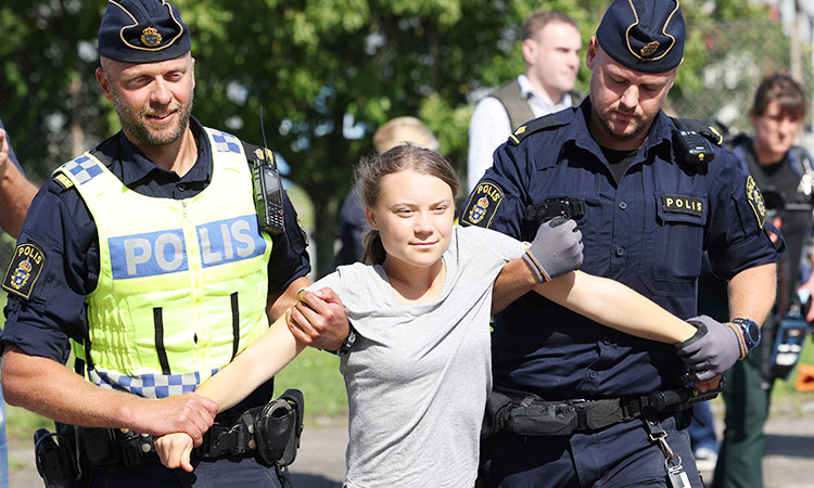 Swedish police remove climate campaigner Greta Thunberg from protest hours after fine