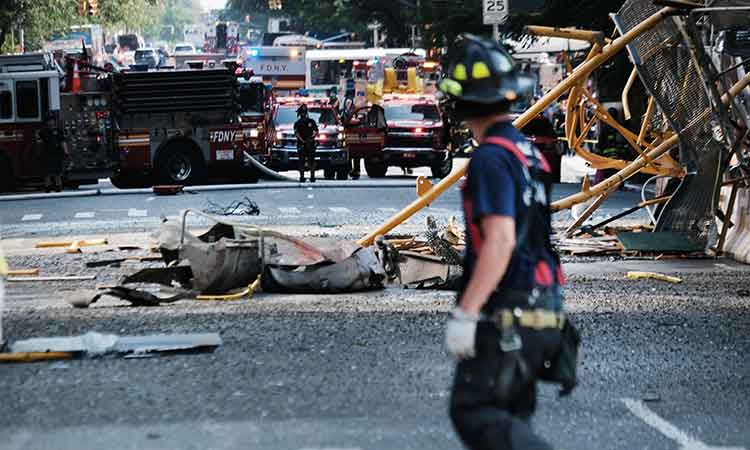 Pedestrians scatter as dramatic New York crane collapses, crashes to street