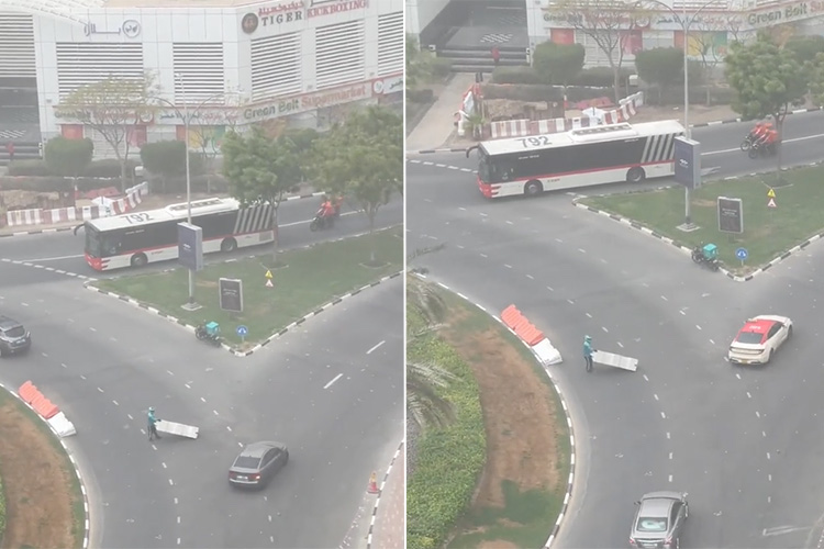 VIDEO: Dubai food delivery rider gets awarded for removing barriers from a road in busy traffic