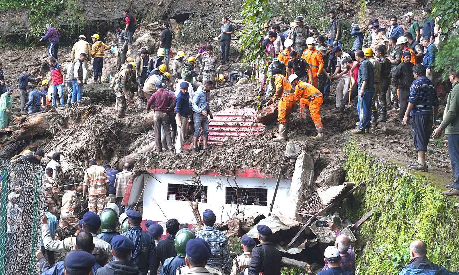 Search for survivors after Indian floods, landslides kill 58