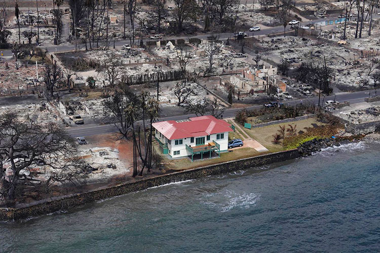 Mystery shrouds the photo of a red-roofed house that survived Hawaii fires after images go viral 