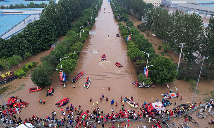  Flooded rivers, trapped residents test China's disaster response system