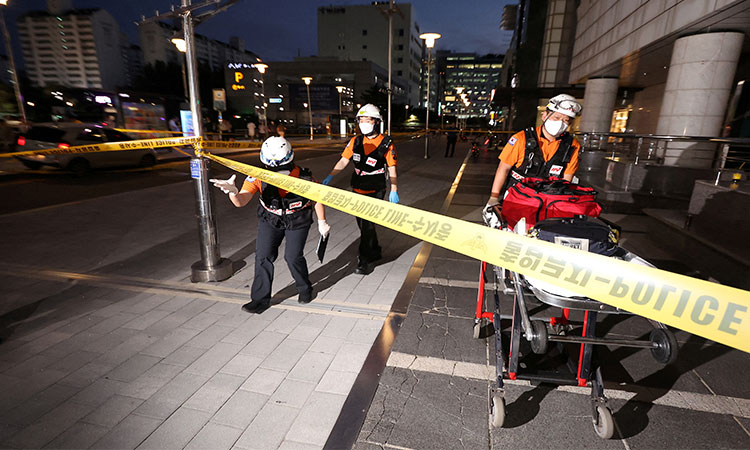 Man rams car onto sidewalk in South Korea, stabs people; at least 14 hurt