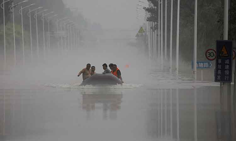 Death toll from central China downpours rises to 50