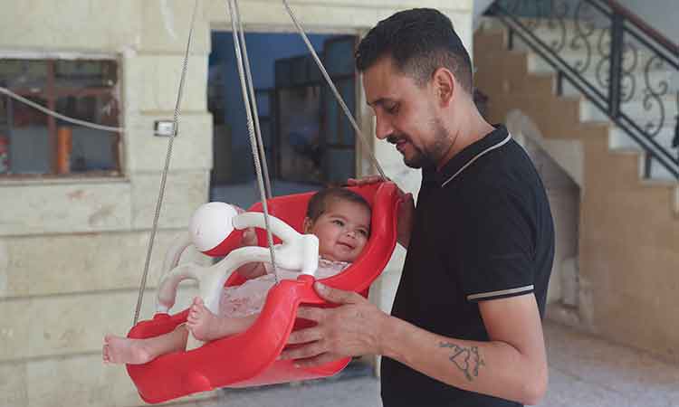 Syrian baby girl born under earthquake rubble is 6 months old now, happy and smiles even at strangers