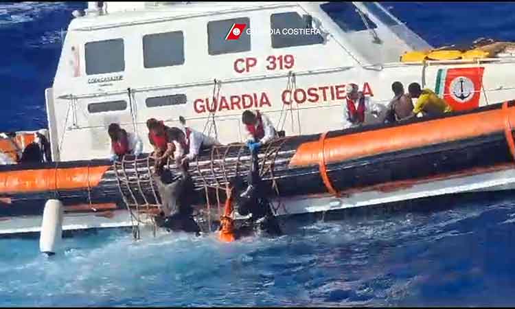 Stranded migrants saved, but dozens missing off Italy in rough seas