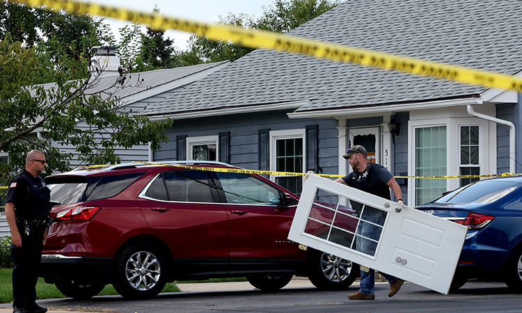 Couple, 2 children and 3 dogs found shot to death in Chicago home