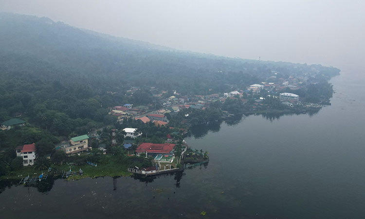 Philippines issues health warning as capital Manila hit by smog, volcanic gas