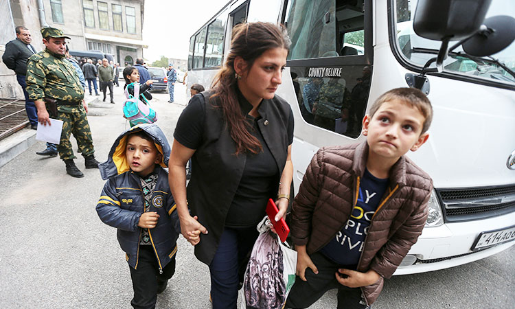 Karabakh refugees cross to Armenia as Azerbaijan takes control