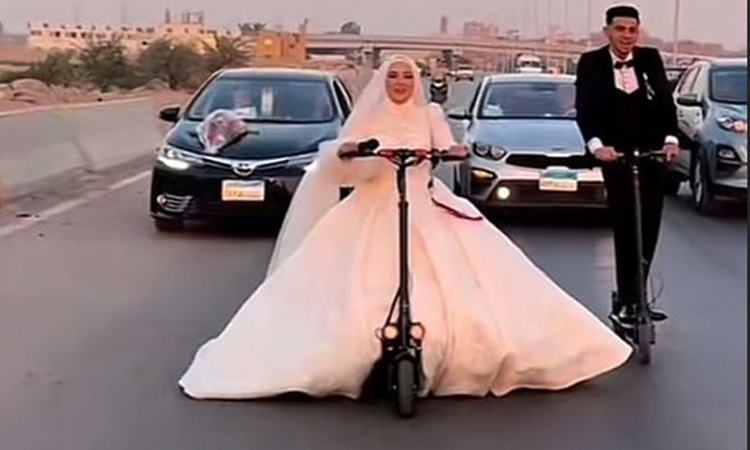 VIDEO: Egyptian couple ride e-scooters to their wedding venue